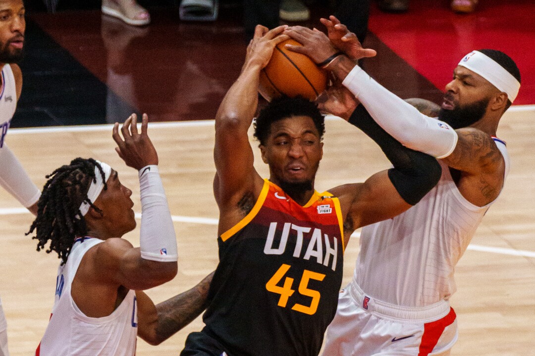 (Trent Nelson  |  The Salt Lake Tribune) LA Clippers guard Terance Mann (14), Utah Jazz guard Donovan Mitchell (45), and LA Clippers forward Marcus Morris Sr. (8) as the Utah Jazz host the Los Angeles Clippers in a Game 5 matchup, NBA basketball in Salt Lake City on Wednesday, June 16, 2021.