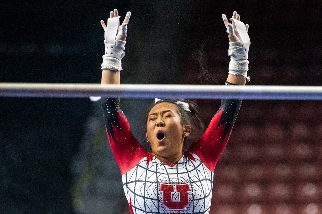 (Rick Egan | The Salt Lake Tribune) Cristal Isa reacts after competing on the uneven bars, for Utah, in the PAC-12 Championships at the Maverik Center, onSaturday, March 20, 2021.