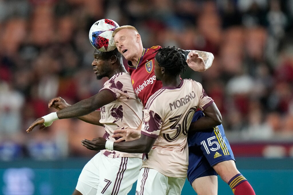 (Rick Bowmer | AP) Real Salt Lake defender Justen Glad (15) competes against Portland Timbers' Santiago Moreno (30) and Franck Boli (7) during the first half of an MLS soccer match Wednesday, May 17, 2023, in Sandy, Utah.