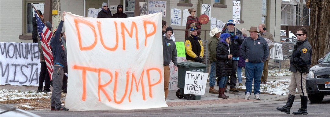 (Al Hartmann  |  The Salt Lake Tribune) 	Crowds protest President Donald Trump outside LDS Welfare Square at 700 S. 800 W. as he tours the facility with church leaders Monday Dec 4. 