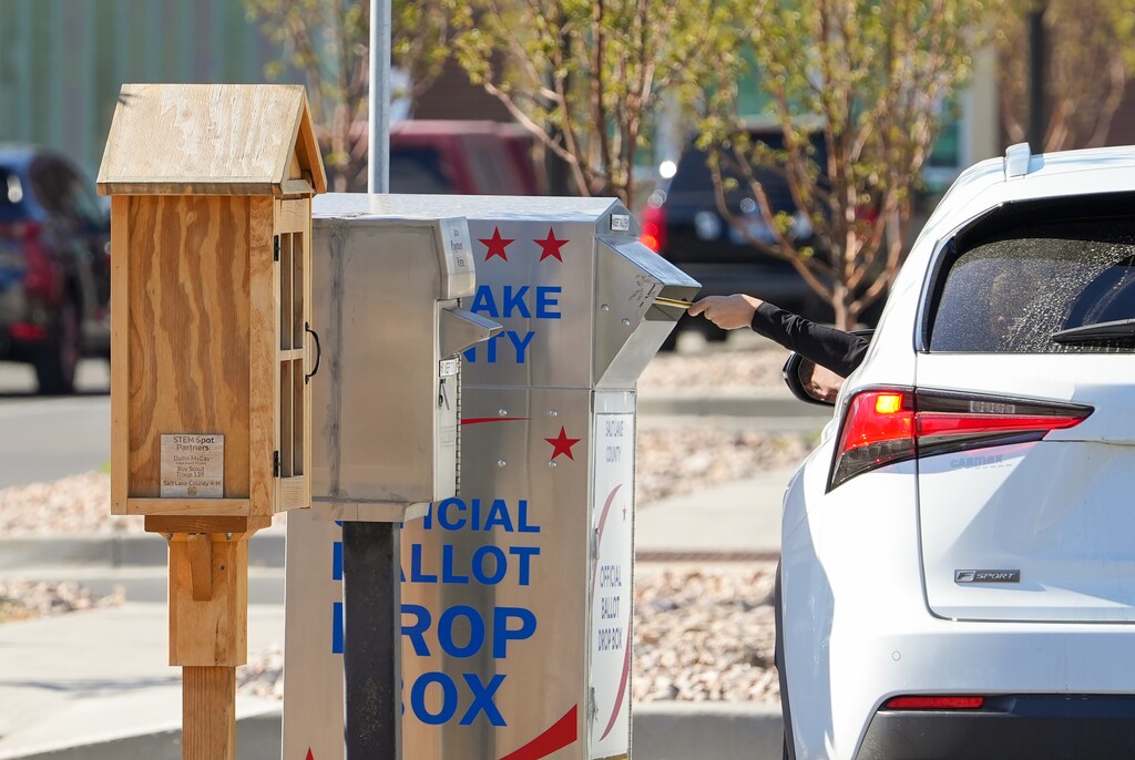 (Chris Samuels | The Salt Lake Tribune) A ballot is placed in a drop box in Riverton, Tuesday, Aug. 12, 2025.