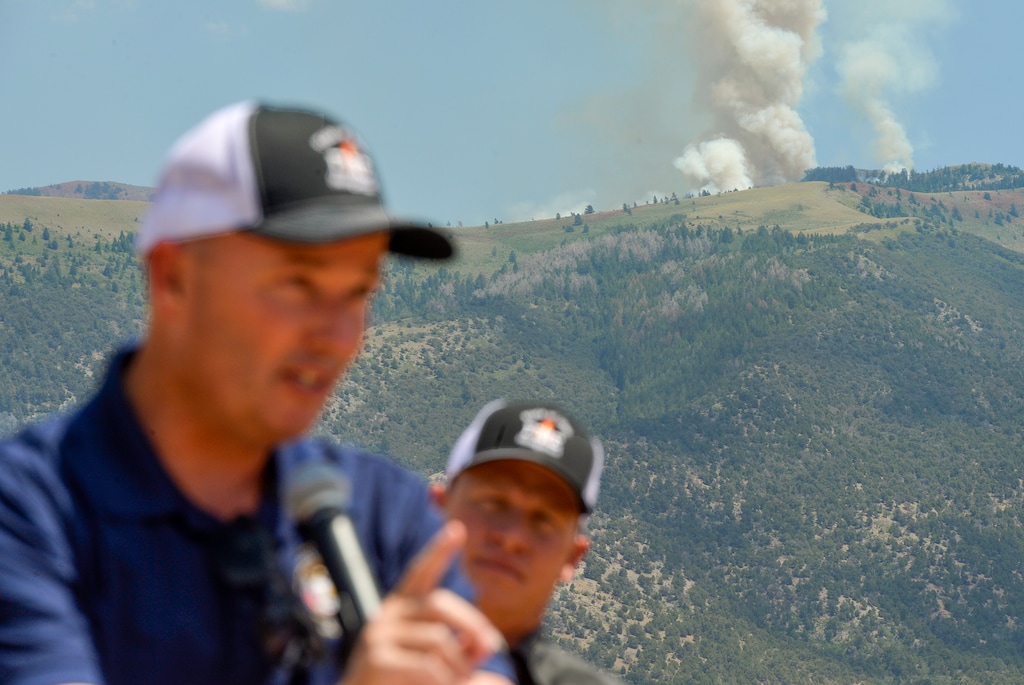 (Chris Samuels | The Salt Lake Tribune) Gov. Spencer Cox speaks in front of the Jacob City fire outside Stockton in Tooele County on Monday, July 11, 2022. Crews continue to battle several area wildfires that sparked over the hot, windy weekend — many of which officials believe were human-caused.