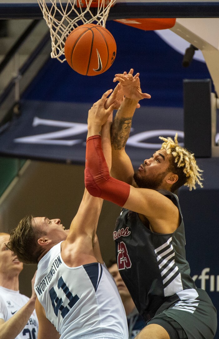 (Rick Egan  |  The Salt Lake Tribune)       Brigham Young Cougars forward Luke Worthington (41) goes for a rebound song with Santa Clara Broncos center Ezekiel Richards (23), in basketball action between Brigham Young Cougars and Santa Clara Broncos at the Marriott Center in Provo, Saturday, Jan. 12, 2019.


