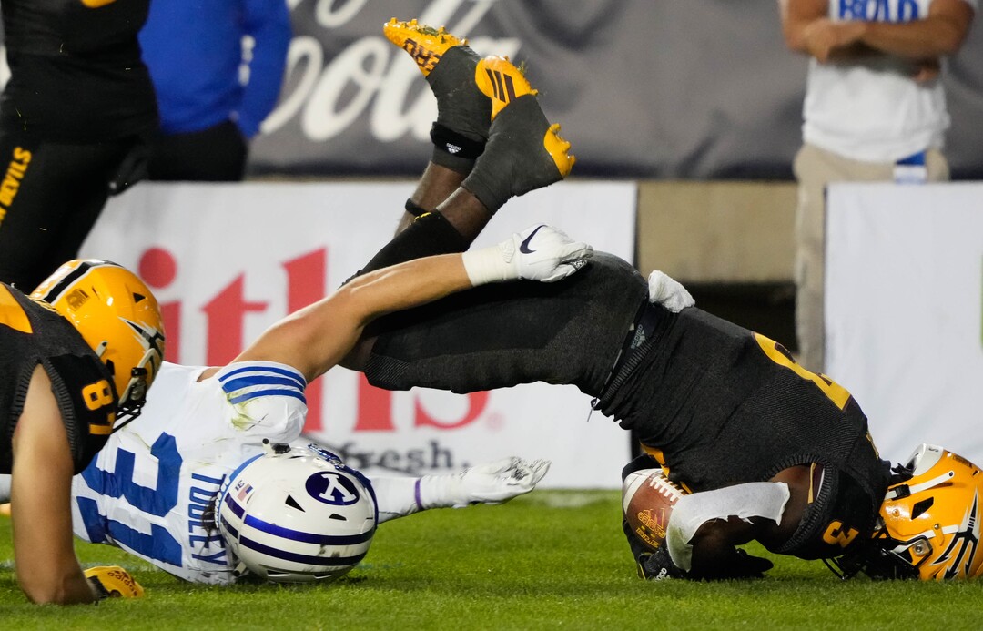 (Francisco Kjolseth | The Salt Lake Tribune) Brigham Young Cougars linebacker Max Tooley (31) brings down Arizona State Sun Devils running back Rachaad White (3) in football action between the Brigham Young Cougars and the Arizona State Sun Devils at LaVell Edwards Stadium in Provo, on Saturday, Sept. 18, 2021.