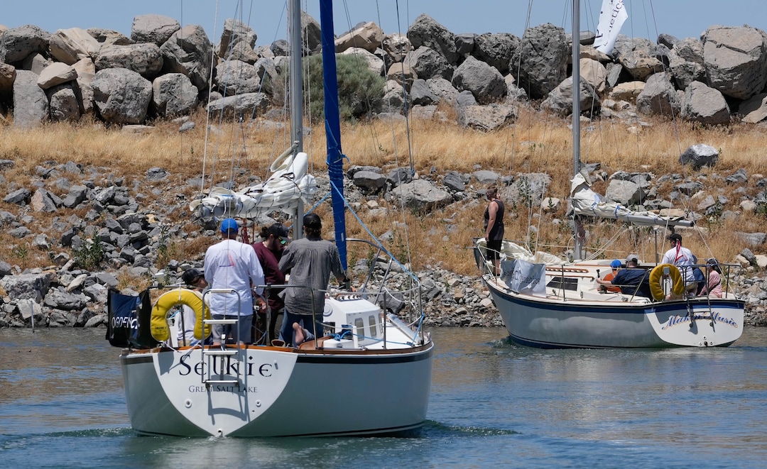 (Francisco Kjolseth  |  The Salt Lake Tribune) Sailboats depart the Great Salt Lake Marina on Saturday, June 15, 2024, to participate in the first Sailfest regatta following a five-year hiatus because of low lake levels and the pandemic. 