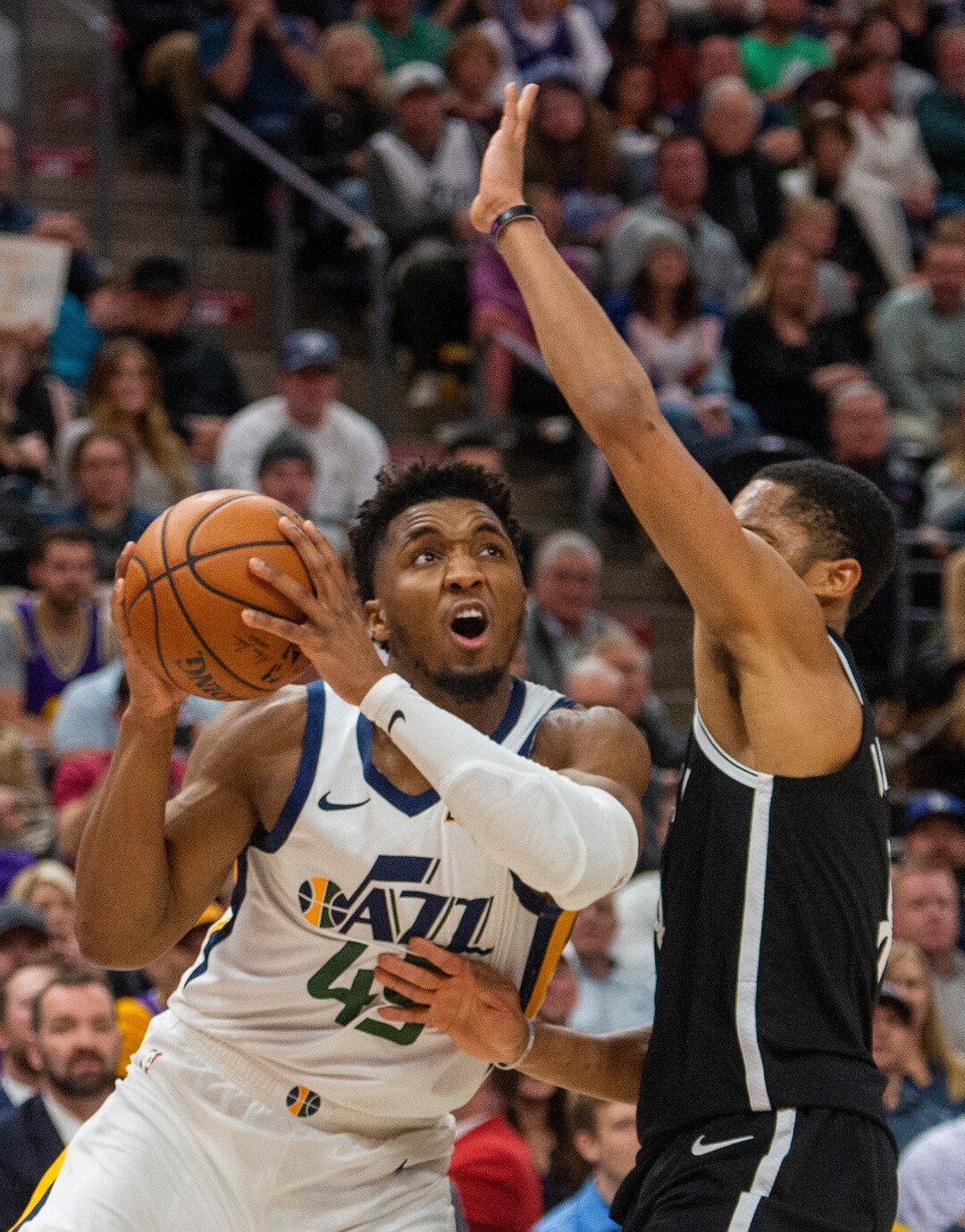 (Rick Egan  |  The Salt Lake Tribune)        Utah Jazz guard Donovan Mitchell (45) looks for a shot as Brooklyn Nets guard Spencer Dinwiddie (8) defends, in NBA basketball action between the Utah Jazz and the Brooklyn Nets in Salt Lake City, Tuesday, Nov 12, 2019.
