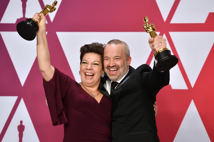 Nina Hartstone, left, and John Warhurst pose with the award for best sound editing for "Bohemian Rhapsody" in the press room at the Oscars on Sunday, Feb. 24, 2019, at the Dolby Theatre in Los Angeles. (Photo by Jordan Strauss/Invision/AP)