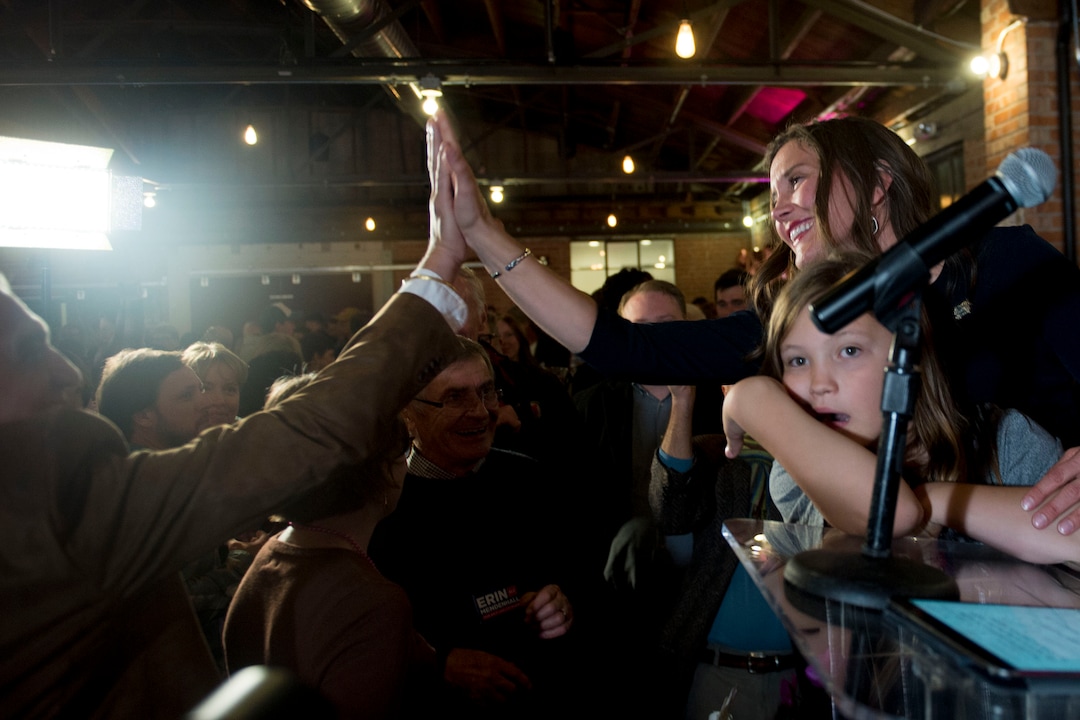 (Jeremy Harmon  |  The Salt Lake Tribune) Salt Lake City mayoral candidate Erin Mendenhall high fives District Attorney Sim Gill after she spoke to supporters after taking a lead over her opponent, Luz Escamilla, on election night Tuesday, Nov. 5, 2019.