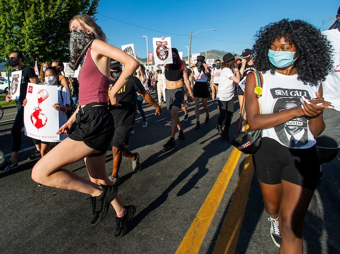 (Rick Egan  |  The Salt Lake Tribune)  Protesters  dance in downtown Salt Lake City, during the Dance Dance Revolution protest for racial equality, on Sunday, Aug. 9, 2020.