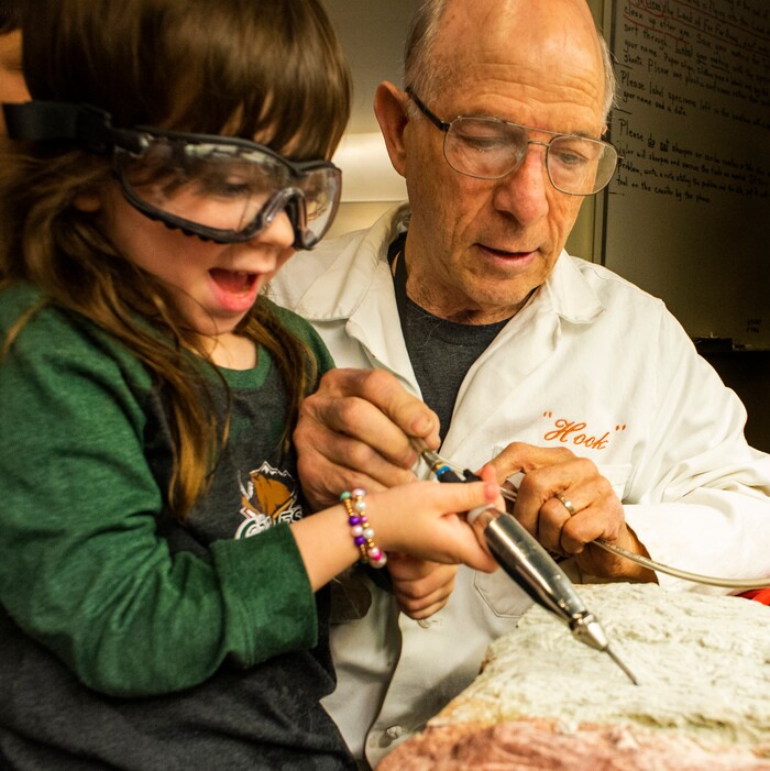(Rick Egan | The Salt Lake Tribune) Lillian Bell Coleman assists Lew Ershler in the Dinosaur lab, during the Utah Natural History Museum DinoFest. The Museum is celebrating it's 50th anniversary in Utah to day and tomorrow, Saturday, Jan. 25, 2020.