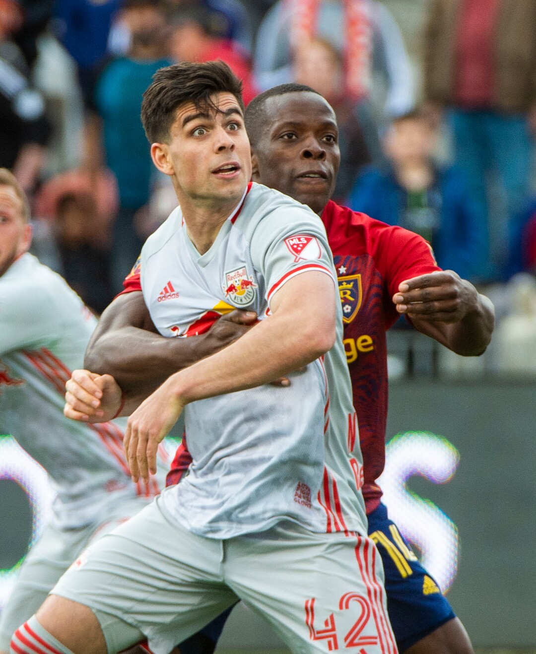 (Rick Egan  |  The Salt Lake Tribune)    New York Red Bulls forward Brian White (42) and  with Real Salt Lake defender Nedum Onuoha (14) battle for position, in MLS acton between Real Salt Lake and the New York Red Bulls at Rio Tinto Stadium, Saturday, March 7, 2020.