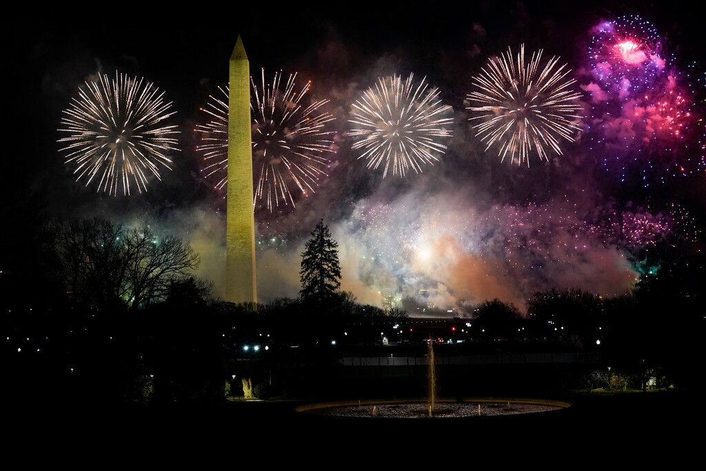 Fireworks light up the sky by the Washington Monument during inauguration ceremonies Wednesday, Jan. 20, 2021, in Washington. (AP Photo/Evan Vucci)