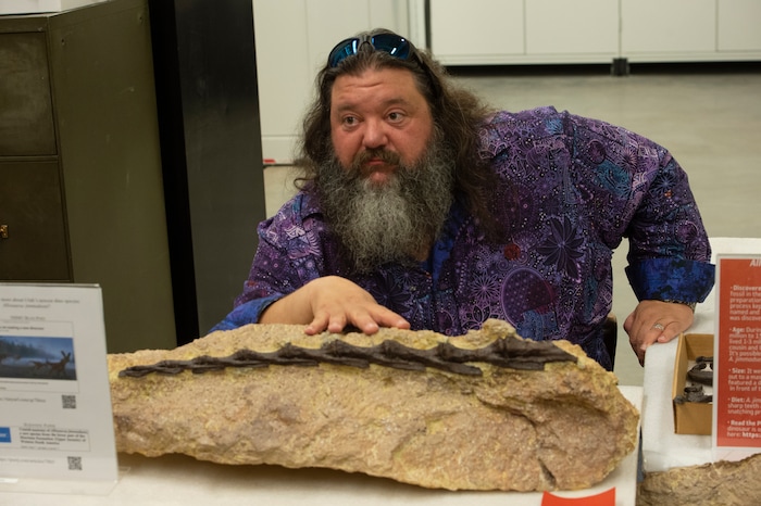 (Rick Egan | The Salt Lake Tribune) Mark Lowewen talks about the new Allosaurus Jimmadseni, during the Utah Natural History Museum DinoFest. The Museum is celebrating it's 50th anniversary in Utah to day and tomorrow, Saturday, Jan. 25, 2020.
