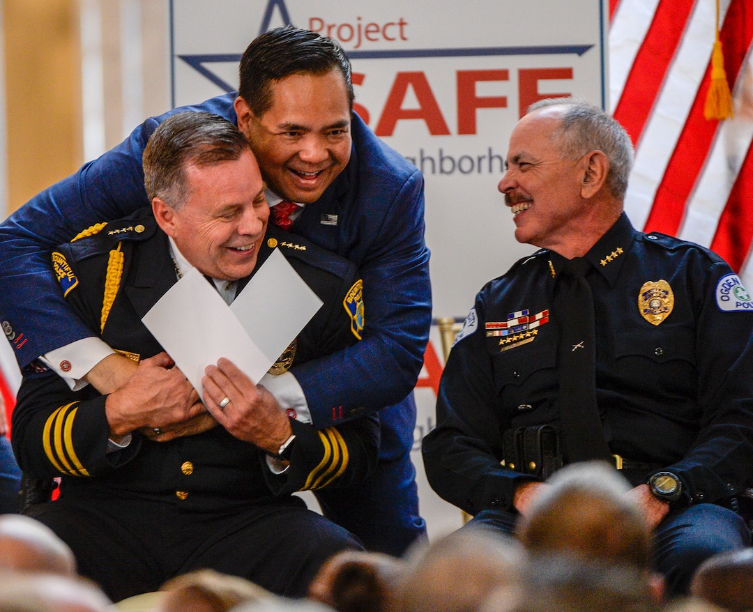 Leah Hogsten  |  The Salt Lake Tribune  l-r Utah Attorney General Sean Reyes bear hugs Bountiful Police Chief Tom Ross as Ogden Police Chief Steven R. Watt laughs along prior to the U. S. Attorney General Law Enforcement Commemoration, October 3, 2018, at the Capitol.  U.S. Attorney General Jeff Sessions touted the success of the nationwide program Project Safe Neighborhoods in Utah.  Wednesday marks the one year anniversary since the Trump administration returned to the policy pushed by the George W. Bush administration. Under Project Safe Neighborhoods, federal prosecutors focus on security stiff sentences for those convicted of gun crimes and reducing violent crimes.