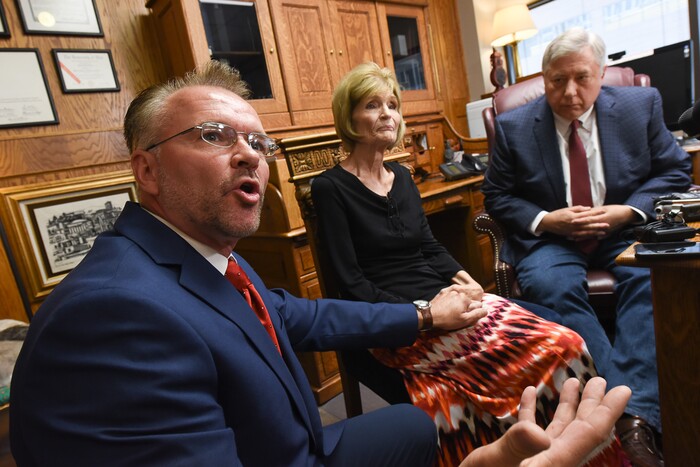 (Francisco Kjolseth  |  The Salt Lake Tribune)  Grant Stanfield and his mother Connie Elison, left, brother and mother of Thomas Stanfield who was shot and killed by a Citadel security guard last week, speak with the press at the office of their attorney, Robert Sykes, at right, in Salt Lake City on Tuesday, June 26, 2018, after filing a civil rights and wrongful death law suit.