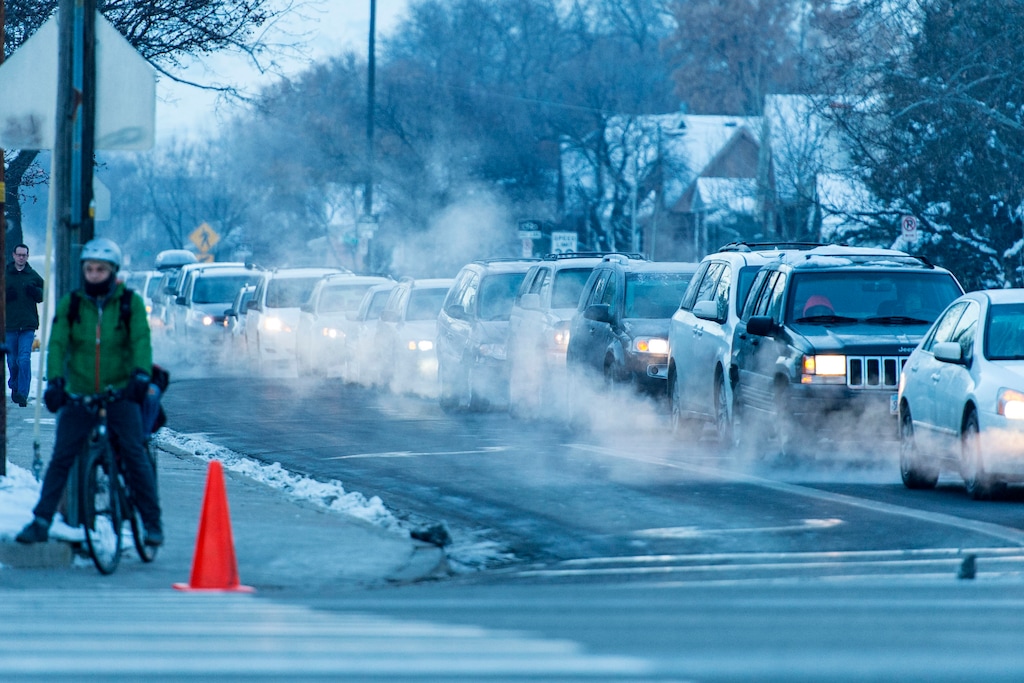 Trent Nelson  |  The Salt Lake TribuneExhaust from cars stopped in traffic at 1700 South 700 East, Salt Lake City, Thursday December 12, 2013.