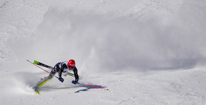 (Francisco Kjolseth | The Salt Lake Tribune) Joachim Mjelde of Westminster College takes a tumble during his first run as he races in men’s slalom as part of the NCAA Skiing Championships on Friday, March 11, 2022, at Park City, Utah.