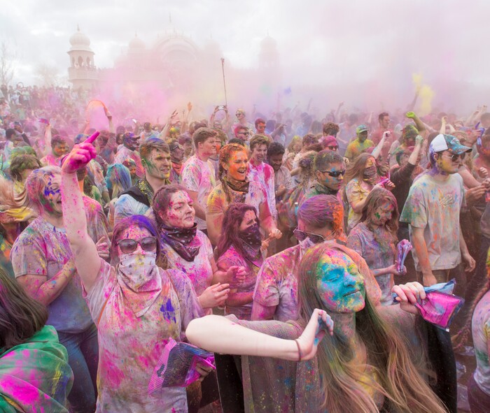 (Rick Egan  |  The Salt Lake Tribune)       Revelers dance to the sounds of Aakansha Bollypop, during the 22nd annual Holi Festival of Colors at the Sri Sri Radha Krishna Temple in Spanish Fork, Saturday, March 24, 2018. The festival which celebrates the beginning or spring is also known as at the Festival of Love.
