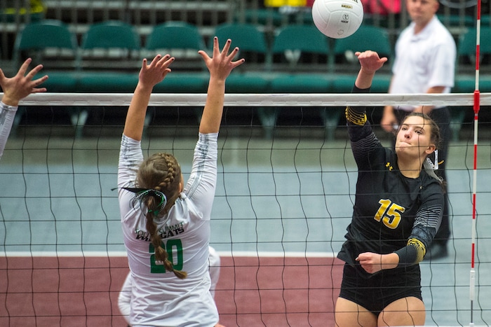 (Chris Detrick  |  The Salt Lake Tribune)  Union's Carly Blake (15) spikes past South Summit's Abigail Flygare (20) during the 3A volleyball state quarterfinals at the UCCU Center at Utah Valley University Wednesday, October 25, 2017.  
