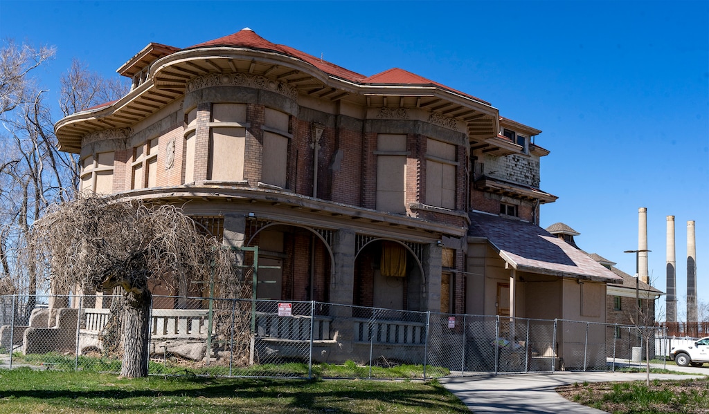 (Rick Egan | The Salt Lake Tribune) Stabilization work is set to begin this fall on Salt Lake City's bruised and battered Fisher Mansion. The building's recently renovated carriage house, meanwhile, is being used as offices for the city's park rangers.