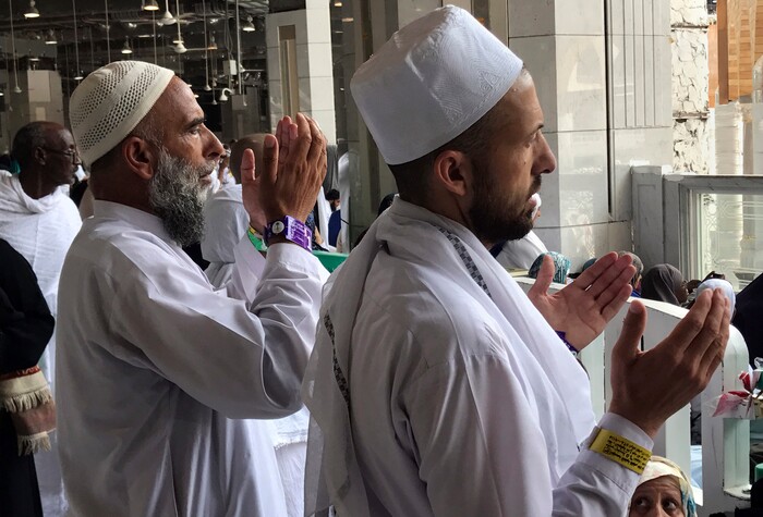 A Muslim pilgrim prays in front of the Kaaba, the cubic building at the Grand Mosque, ahead of the annual hajj pilgrimage, in the Muslim holy city of Mecca, Saudi Arabia, Tuesday, Aug. 29, 2017. (AP Photo/Khalil Hamra)