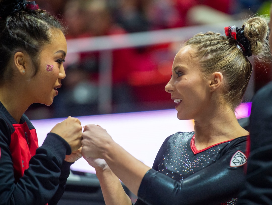 (Rick Egan  |  The Salt Lake Tribune)   Kari Lee gives MyKayla Skinner a fist-bump before Skinner's performance on the floor, in Gymnastics action at the Jon M. Huntsman Center, Saturday, March 2, 2019.