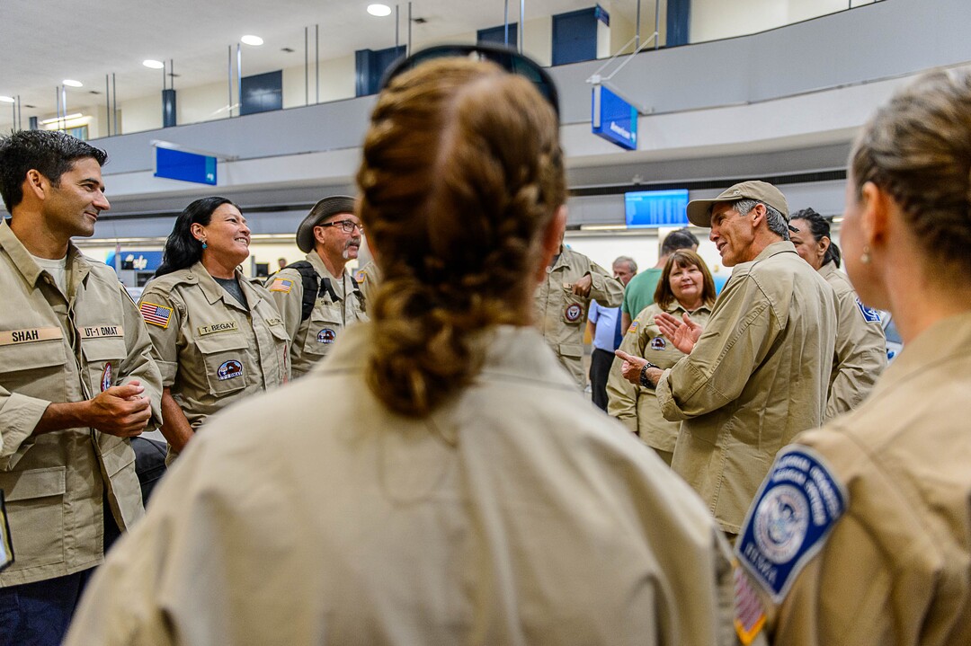 (Trent Nelson | The Salt Lake Tribune)  Commander Steven Bott, right, addresses his team as members of Utah's DMAT-1 (Disaster Medical Assistance Team) meet at the Salt Lake City Airport en route to Texas, Tuesday August 29, 2017. 36 members of the team are headed to the Houston area to help with the fallout of Hurricane Harvey.