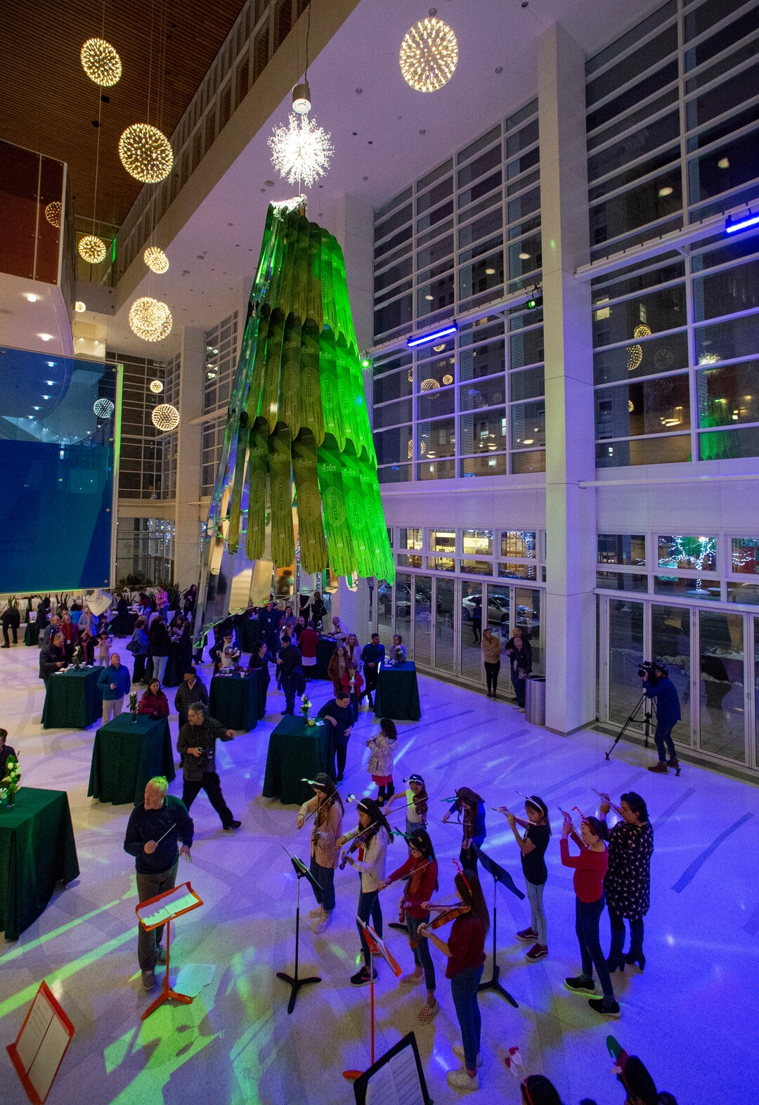 (Rick Egan  |  The Salt Lake Tribune) Eccles Theater unveils its annual Holiday Tree art installation, Monday, Dec. 2, 2019. The title is "Winter Wind," created by Rob Beishline & Shelley Beishline of Tooza Design. The work features 75 snowboards.