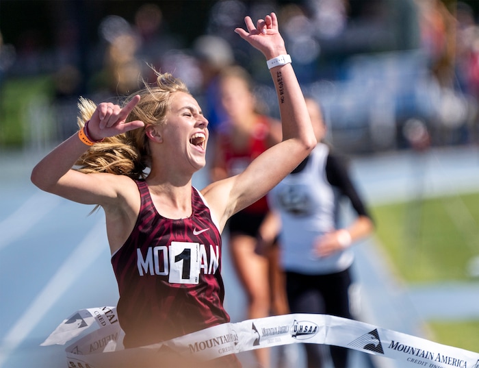 (Rick Egan | The Salt Lake Tribune) Kate Heywood, Morgan High School, celebrates her State Championship win in the Girls 3A 3200 Meter run, at BYU on Friday, May 20, 2022.
