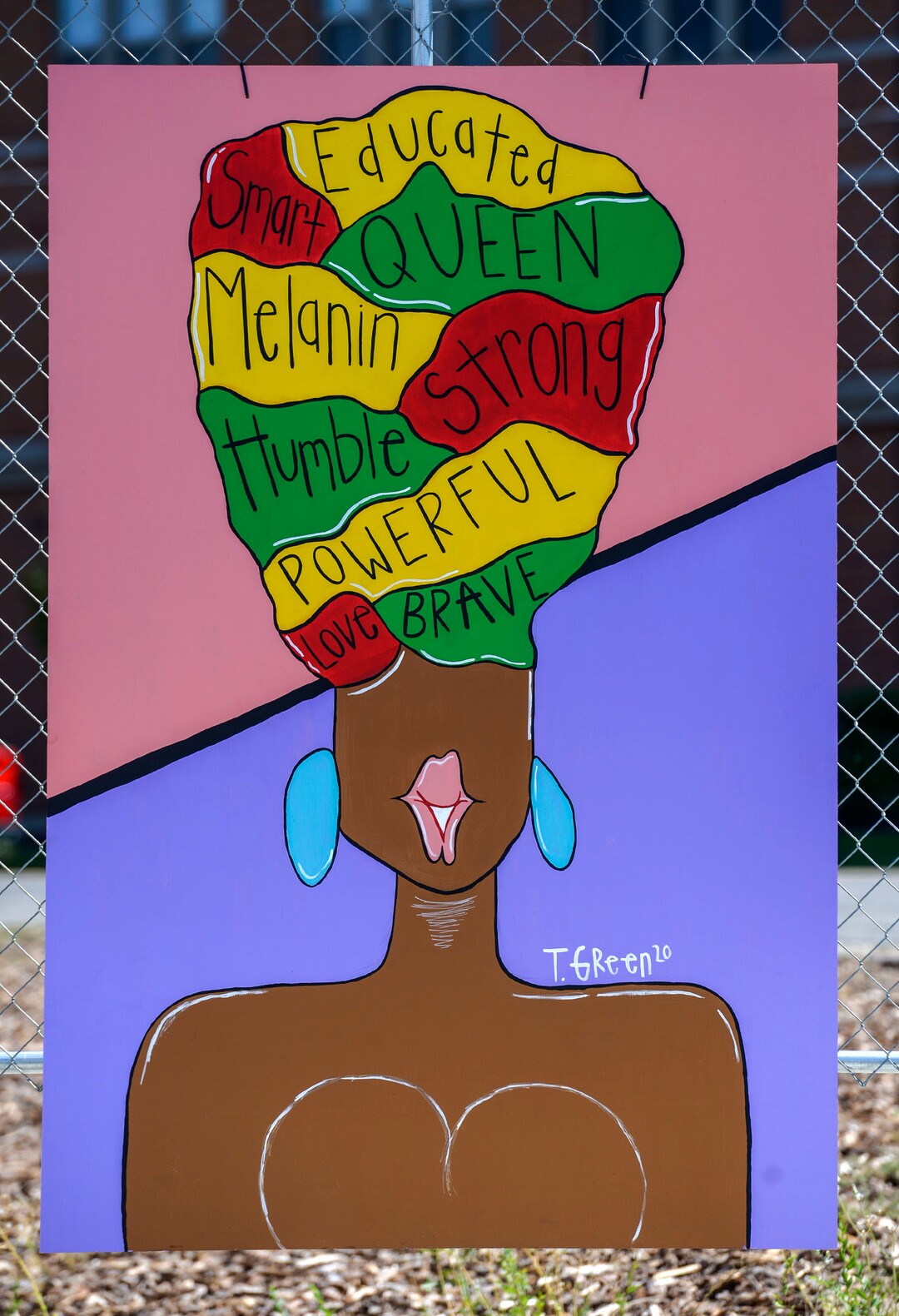 (Leah Hogsten  |  The Salt Lake Tribune) Artist Tamia Green created a painting focused on "empowering Black women" that's on display on 25th Street in Ogden.