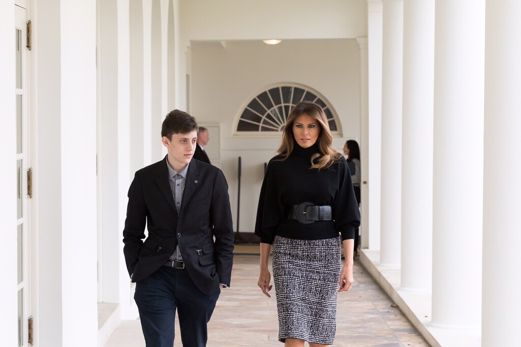 (Andrea Hanks | Official White House Photo | The Washington Post) First lady Melania Trump walks Kyle Kashuv, a junior at Marjory Stoneman Douglas High School, to meet the president.