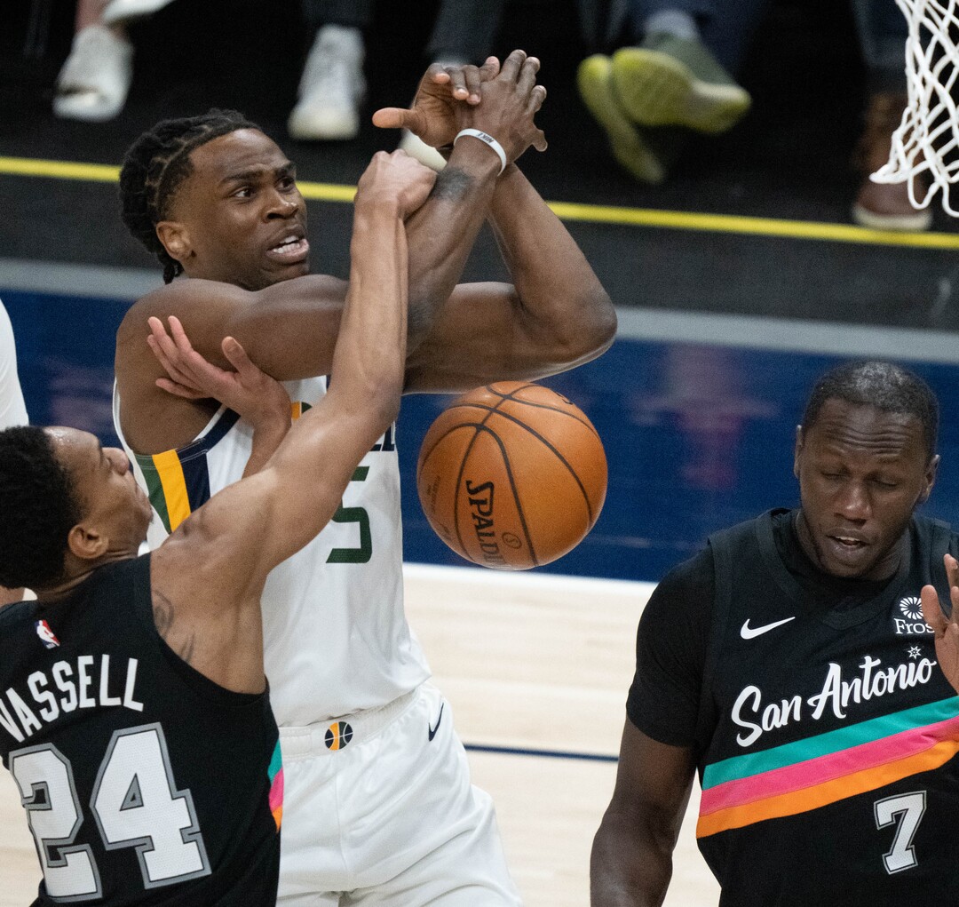 (Francisco Kjolseth | The Salt Lake Tribune) San Antonio Spurs guard Devin Vassell (24) tangles up Utah Jazz forward Jarrell Brantley (5) in NBA action between the Utah Jazz and the San Antonio Spurs at Vivint Smart Home Arena, on Wednesday, May 5, 2021.
