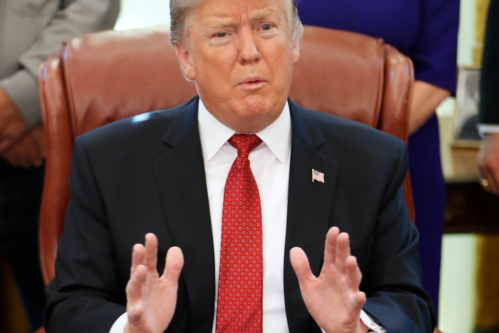 (Jacquelyn Martin  |  AP photo)  In this Jan. 31, 2019, photo, President Donald Trump speaks in the Oval Office of the White House in Washington. Trump is expected to declare near-total triumph over the Islamic State group in Syria in his State of the Union address, but U.S. defense officials are increasingly fearful that the militants are simply biding their time until the Americans leave the battlefield as planned.