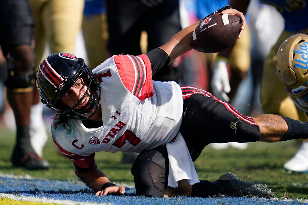 (Ashley Landis | AP) Utah quarterback Cameron Rising (7) reacts after scoring a two-point conversion during the second half of an NCAA college football game against UCLA in Pasadena, Calif., Saturday, Oct. 8, 2022.