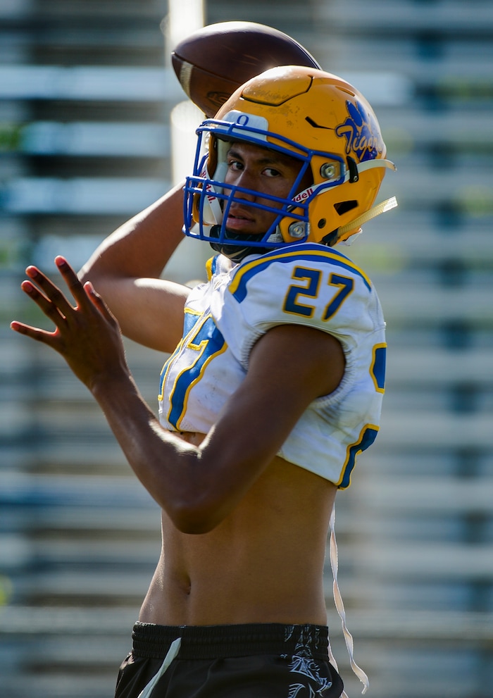 (Leah Hogsten | The Salt Lake Tribune) Orem High School football team quarterback, Micah Fe'A, August 8, 2019.