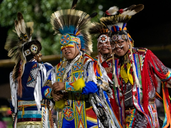 (Leah Hogsten | The Salt Lake Tribune Dancers congratulate each other after every dance at the 41st Annual Paiute Indian Tribe of Utah Restoration Gathering, Aug. 13, 2021 in Cedar City, Utah.