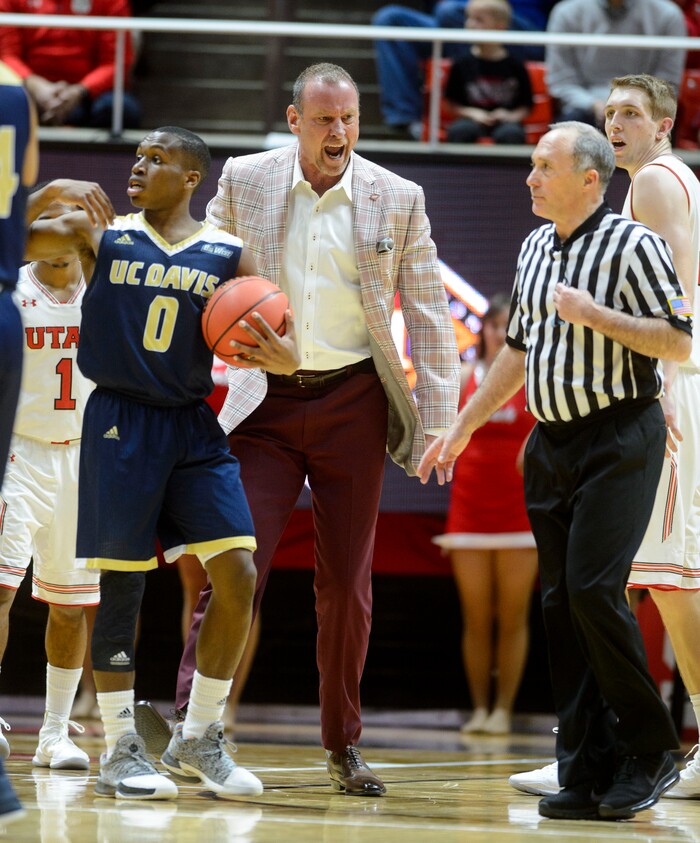 (Steve Griffin  |  The Salt Lake Tribune) University of Utah head coach  Larry Krystkowiak storms onto the court after a foul was called on his team during the Utah versus UC Davis men's NIT basketball game at the Huntsman Center in Salt Lake City Wednesday March 14, 2018. Krystkowiak was ejected from the game.
