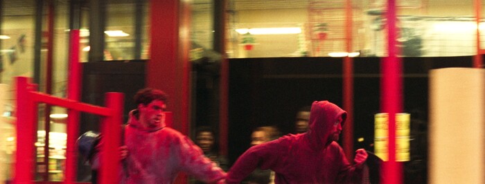 (Courtesy  |  A24 Films) Brothers Nick (Benny Safdie, left) and Connie (Robert Pattinson) race to avoid police after a botched bank robbery, in the New York thriller "Good Time."