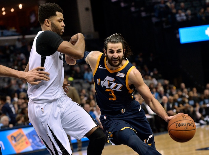 Utah Jazz guard Ricky Rubio (3) drives against Memphis Grizzlies guard Andrew Harrison during the second half of an NBA basketball game Wednesday, Feb. 7, 2018, in Memphis, Tenn. (AP Photo/Brandon Dill)
