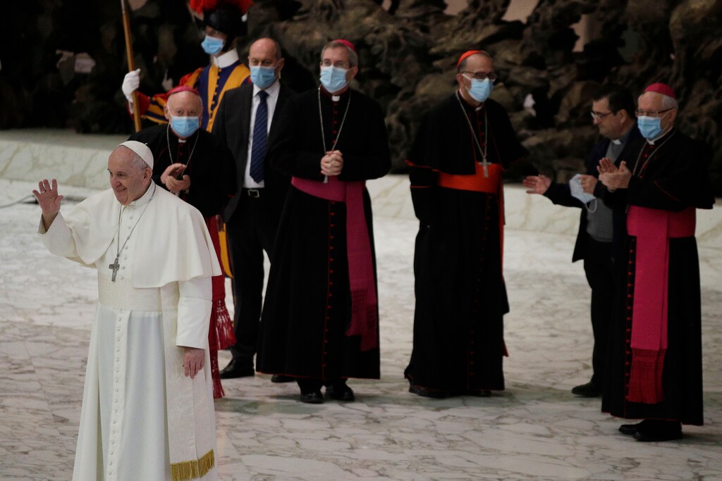 (Gregorio Borgia | AP) Pope Francis waves to faithful at the end of the weekly general audience in the Paul VI hall at the Vatican, Wednesday, Oct. 21, 2020.