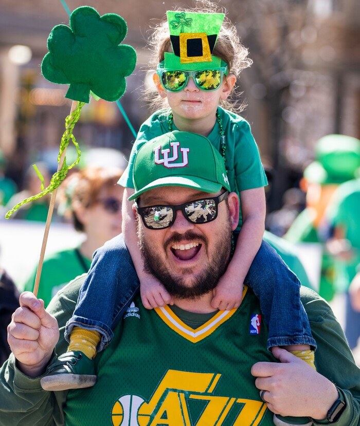 (Rick Egan | The Salt Lake Tribune) Sadie Galvas watches the Saint Patrick's Day Parade at the Gateway on Saturday, March 11, 2023.