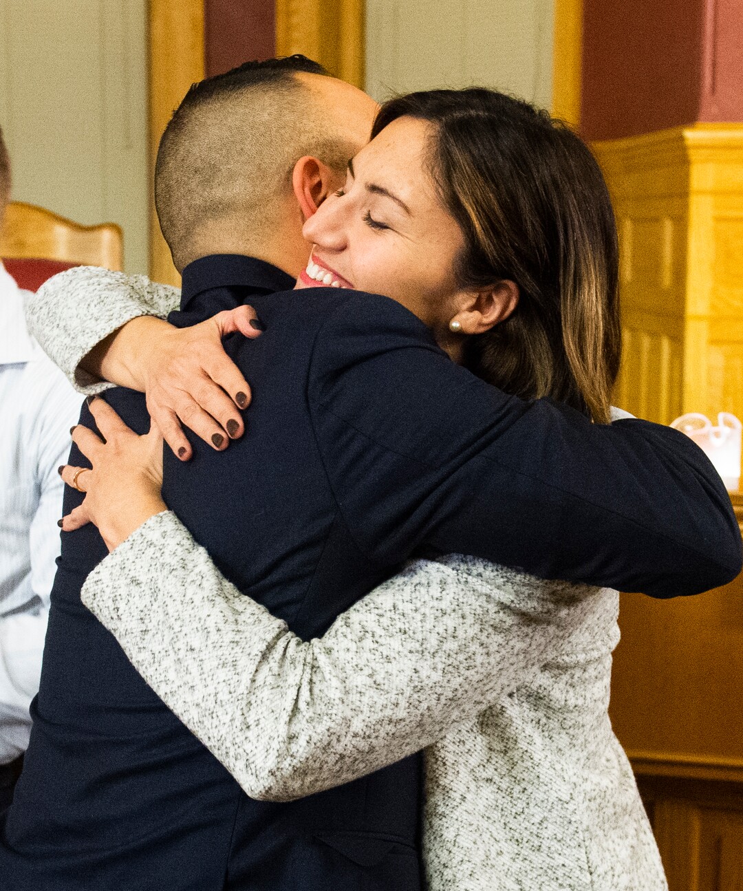 (Rick Egan  |  The Salt Lake Tribune)     Darin Masao Mano gets a hug from Analia Valdemorosis after being sworn in as a member of the the Salt Lake City Council. Mano was selected from 24 candidates, he will takes the position vacated by Mayor Erin Mendenhall. Tuesday, Jan. 21, 2020.