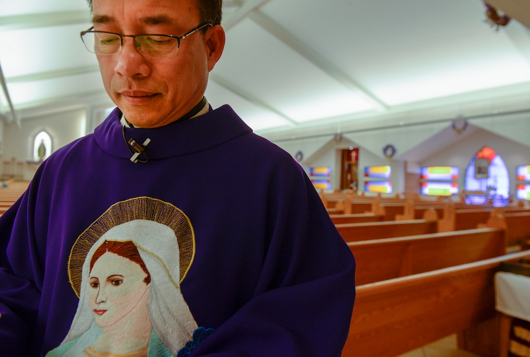 Leah Hogsten  |  The Salt Lake Tribune Rev. Tai Trong Nguyen of Our Lady of Perpetual Help Catholic church leads morning mass,  Wednesday, Dec. 5, 2018 in Kearns. The mostly Vietnamese congregation purchased the former Church of Jesus Christ of Latter-day Saints church in 2003 and now holds services in the former Mormon church's basketball gymnasium. Mormons now make up less than 50% of Salt Lake County. 