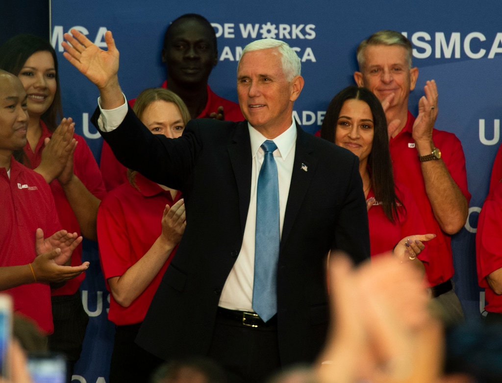 (Rick Egan  |  The Salt Lake Tribune)   Vice President Mike Pence waves to the crowd introduced to the crowd at Merit Medical, Thursday, Aug. 22, 2019.