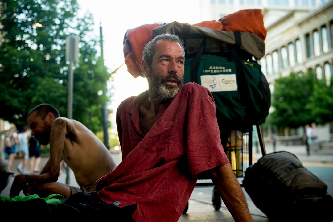 (Jeremy Harmon |  The Salt Lake Tribune) Chris Coons, right, and Emil Miller sit on the sidewalk outside City Creek Mall in Salt Lake City on July 11, 2019.