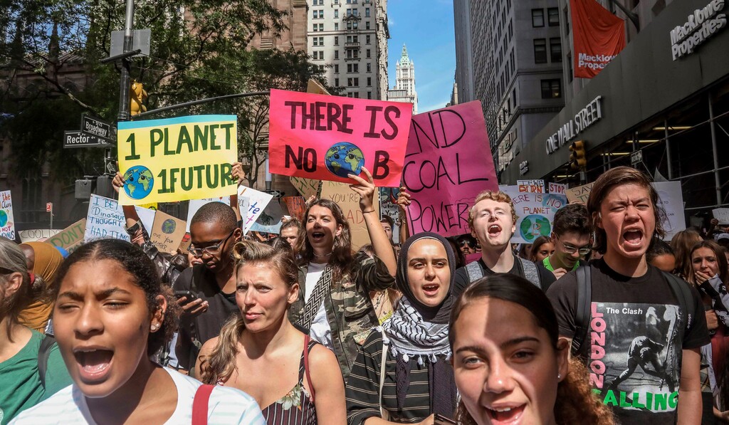 (Bebeto Matthews | AP file photo)  Climate change activists participate in an environmental demonstration as part of a global youth-led day of action in New York on Friday, Sept. 20, 2019.
