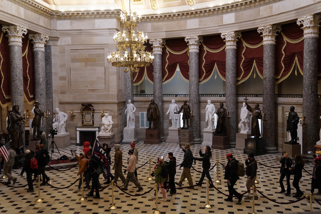 (Anna Moneymaker | The New York Times) People protesting the presidential election results inside the Capitol in Washington on Wednesday, Jan. 6, 2020. The Capitol building was placed on lockdown, with senators and members of the House locked inside their chambers, as Congress began debating President-elect Joe Biden’s victory. President Trump addressed supporters near the White House before protesters marched to Capitol Hill.