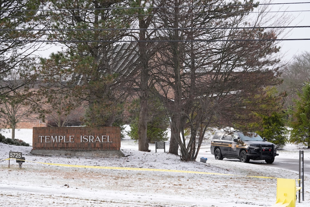 (Paul Sancya | AP) A police vehicle sits outside the Temple Israel synagogue Friday, March 13, 2026, in West Bloomfield Township, Michigan. Latter-day Saint leaders have condemned the attack.