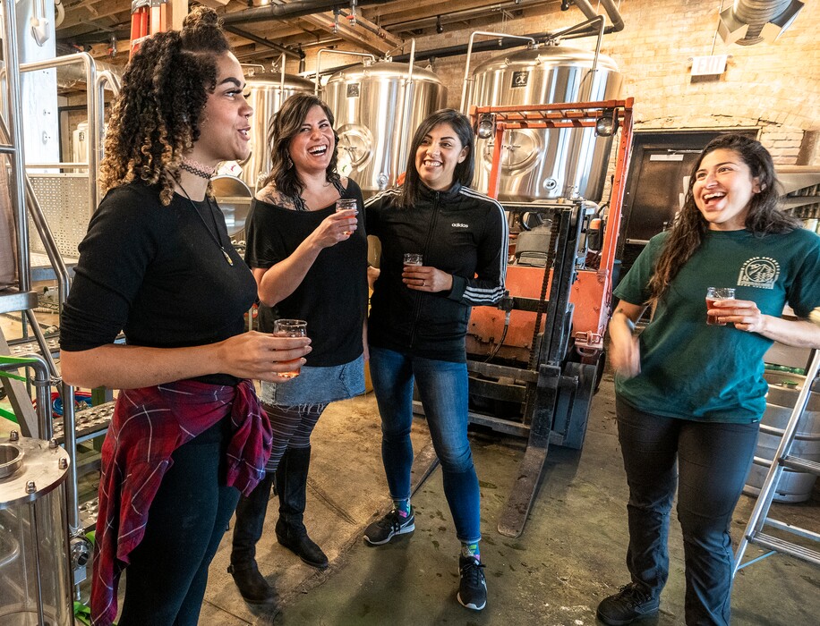 (Leah Hogsten | The Salt Lake Tribune) Left to right: Shyree Rose, Stephanie Biesecker, Melissa Diaz and Mel Dahud, all members of the Brown Gradient Beer Wenches — women of color who work at local breweries — talk at Bewilder Brewing Company about their love of beer and how they got into the industry.