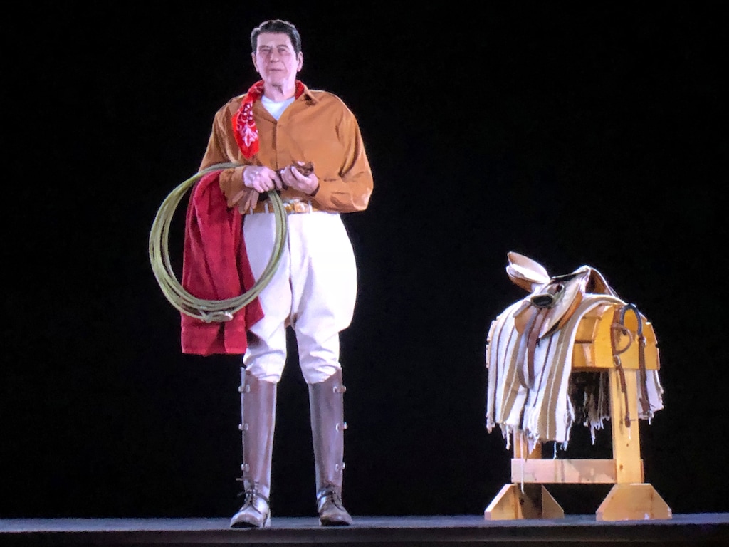 (AP Photo/Amanda Lee Myers) Former President Ronald Reagan appears in western attire, as he might appear at his Santa Barbara ranch, but as a hologram, on display at the Ronald Reagan Presidential Library in Simi Valley, Calif., Wednesday, Oct. 10, 2018. The Reagan Library says it worked with the same Hollywood special effects wizards who helped bring singers Michael Jackson, Maria Callas and Roy Orbison back to life on stage. Officials say the goal is to allow visitors to see Reagan back in the Oval Office, campaigning or at his beloved ranch.